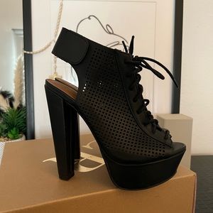 Size 7 lace up heels with Velcro fasteners